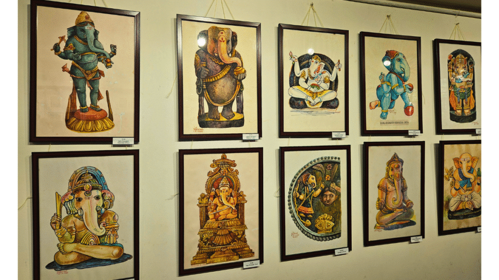 A wall of N.C. Desai’s paintings from his Global Ganesha series, depicting various cultural interpretations of Lord Ganesha, displayed at the Hubballi Art Exhibition.