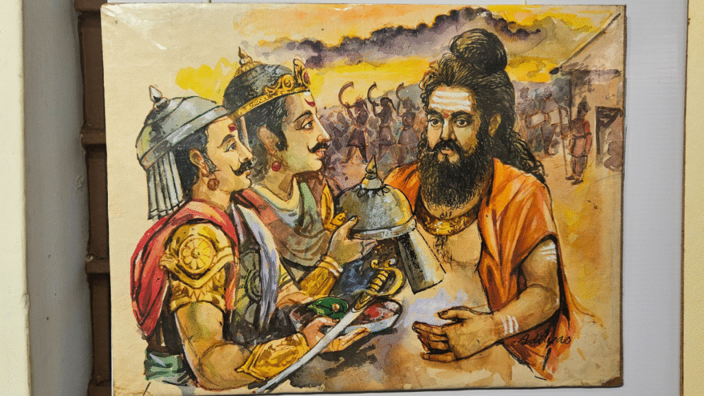 A painting by N.C. Desai depicting two ancient Indian warriors receiving blessings from their guru before a great battle, showcased at the Hubballi Art Exhibition.