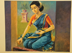 A Heartfelt Glimpse into N.C. Desai’s Painting Exhibition in Hubballi A traditional Indian woman creating a rangoli, painting by artist N.C. Desai displayed at the Hubballi Art Exhibition.